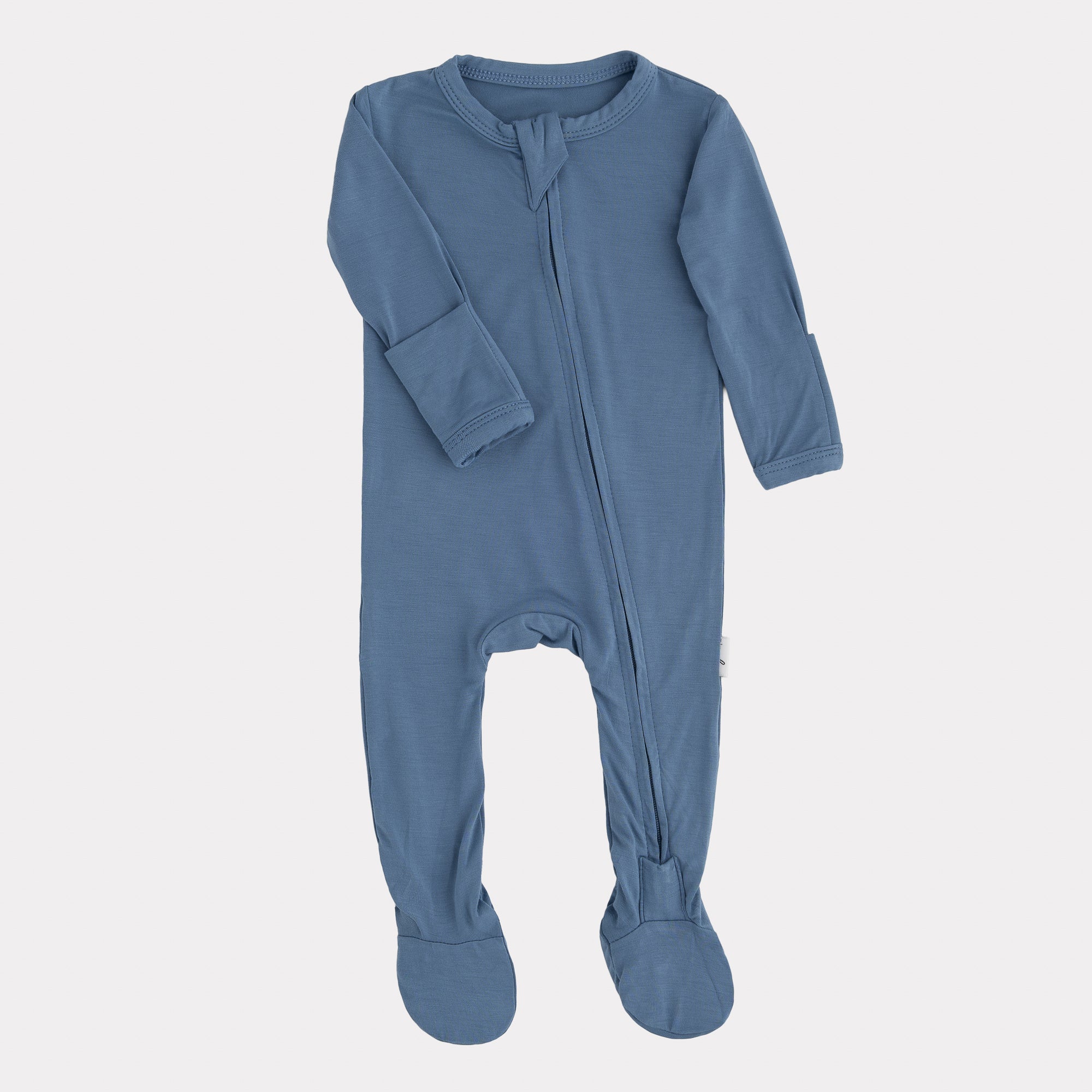 Blue footed sleeper for baby on white background