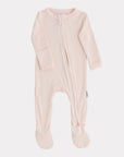 Pink baby onesie with a zipper on a light gray background